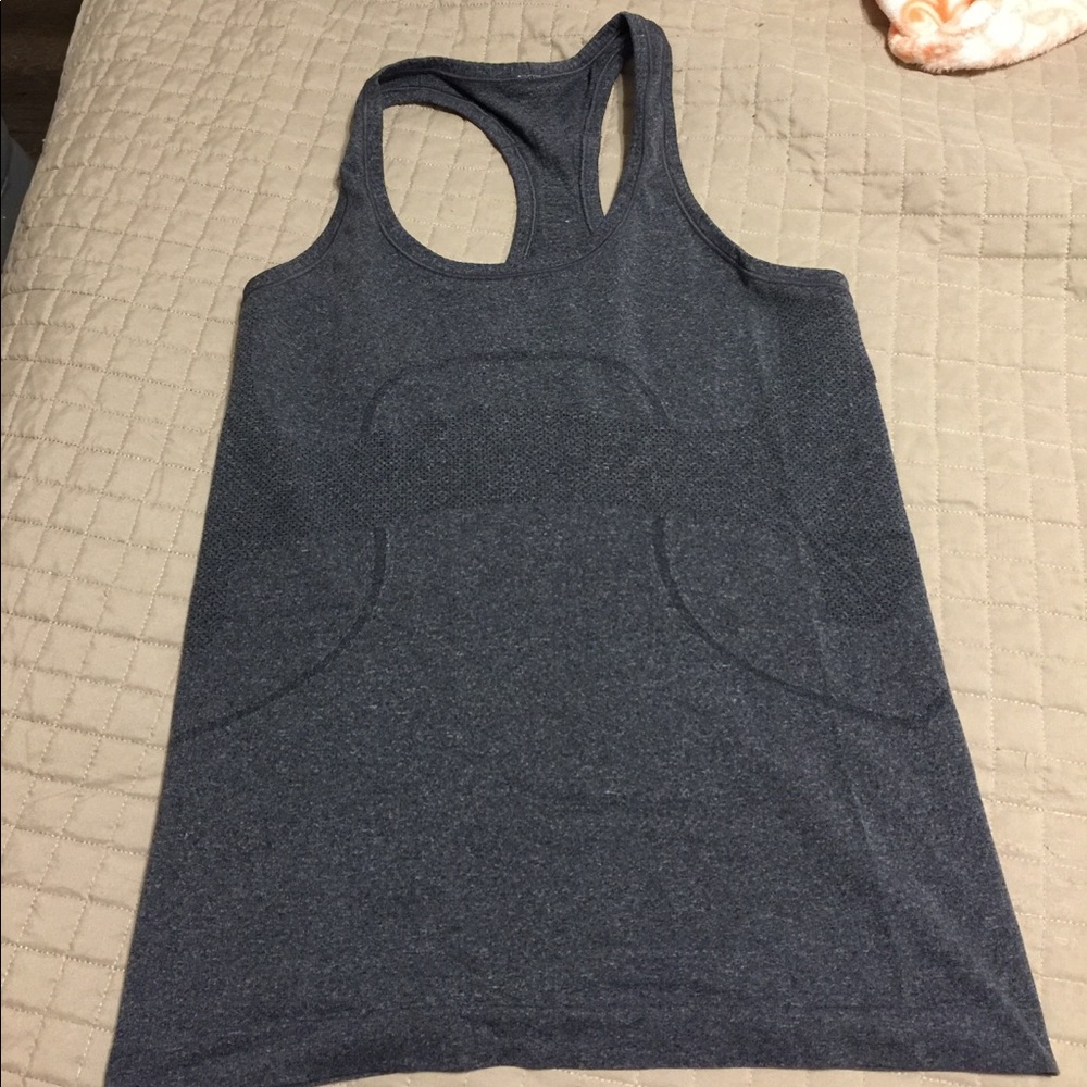 2 Lululemon swiftly Tanks 6